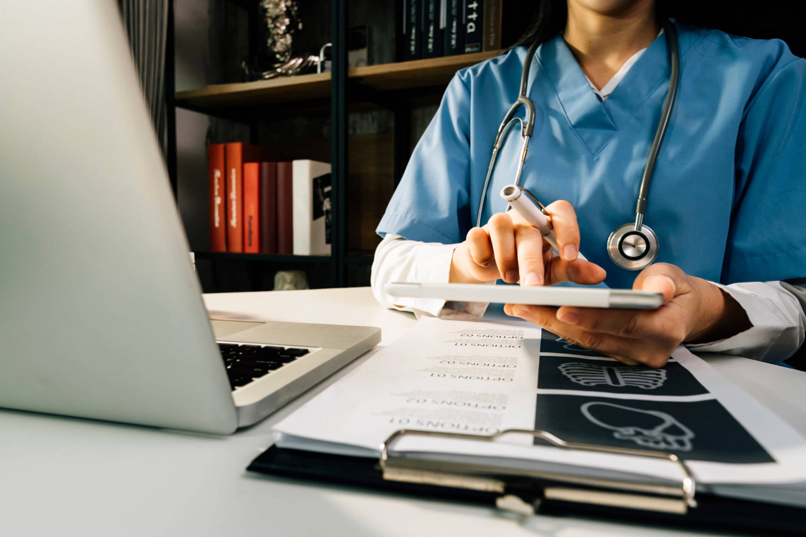 Doctor work on digital tablet healthcare doctor technology table